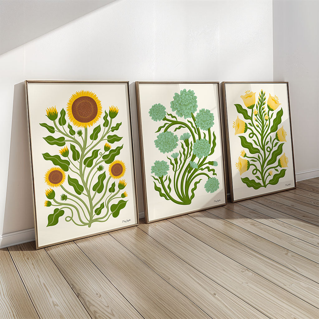 A set of 3 fine art prints showcases stylised sunflowers, green allium flowers, and yellow tulips, ideal for creating a charming floral gallery wall.
