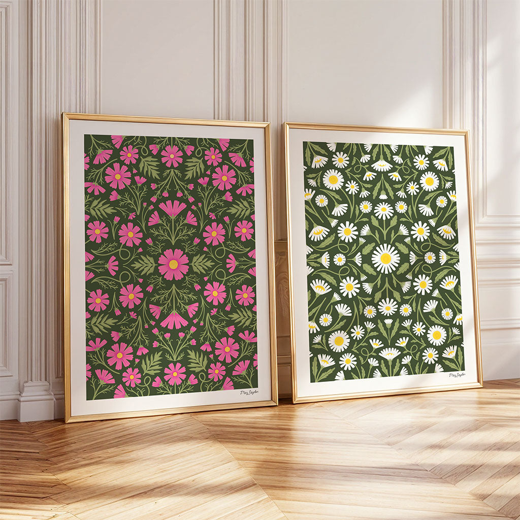 The Heritage set of 2 art prints includes one with pink flowers and green leaves, and one featuring white daisies on a green background, in a vintage botanical style that's ideal for earthy-toned interiors.