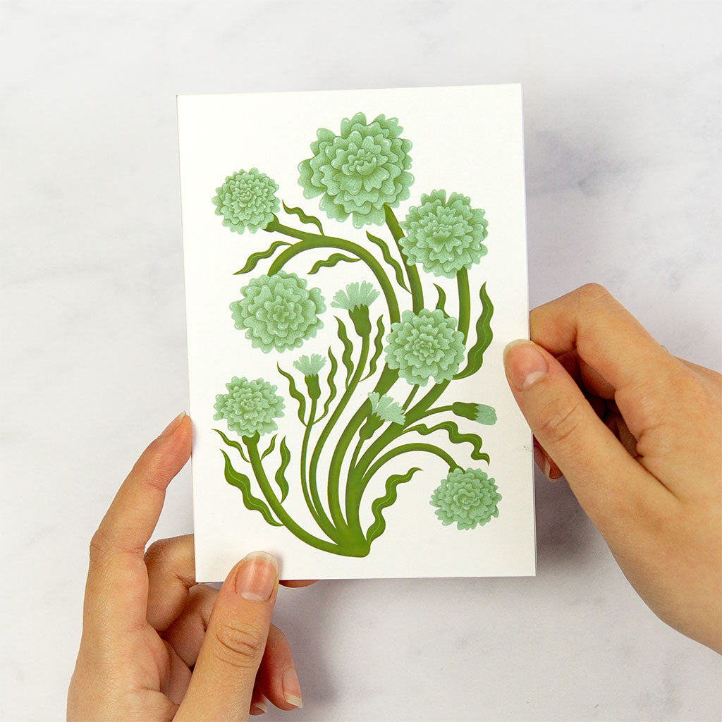 The Green Carnations Greetings Card features a vintage style botanical illustration of green flowers and leafy stems.