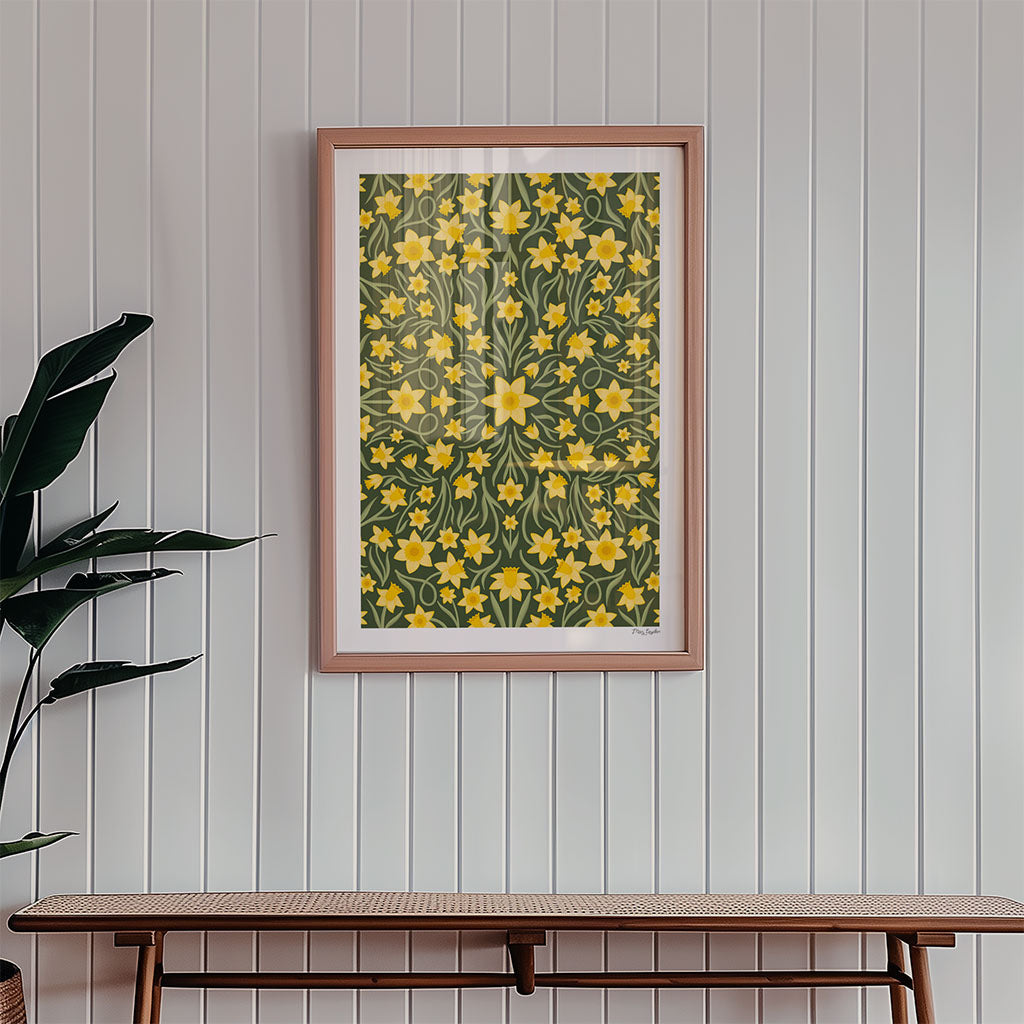 The Heritage Daffodils Art Print showcases a symmetrical design of yellow daffodils and green leaves on a dark background, a vintage botanical piece ideal for spring decor.