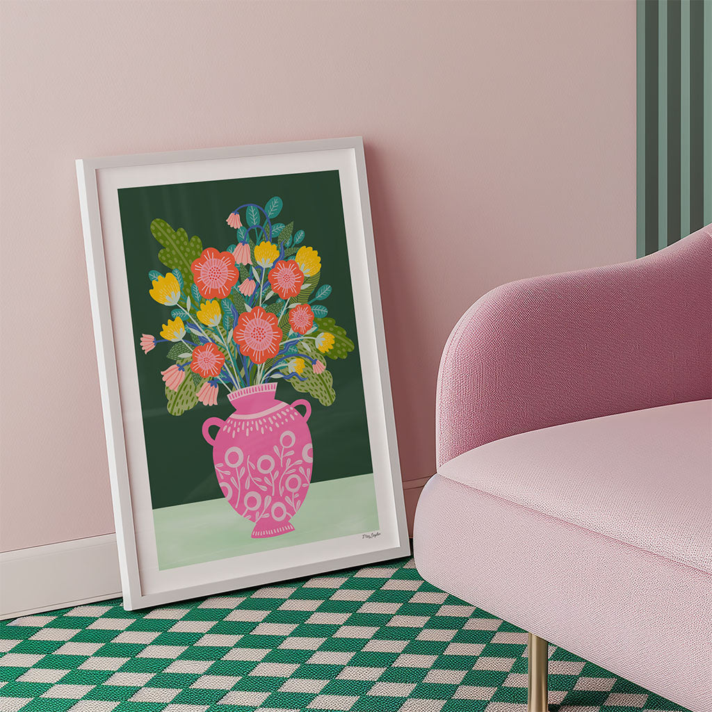 The Flower Vase Art Print features a vintage-inspired pink vase with a vibrant floral bouquet and green leaves on a dark green background—ideal for bringing colourful vibes as floral wall art to your space.