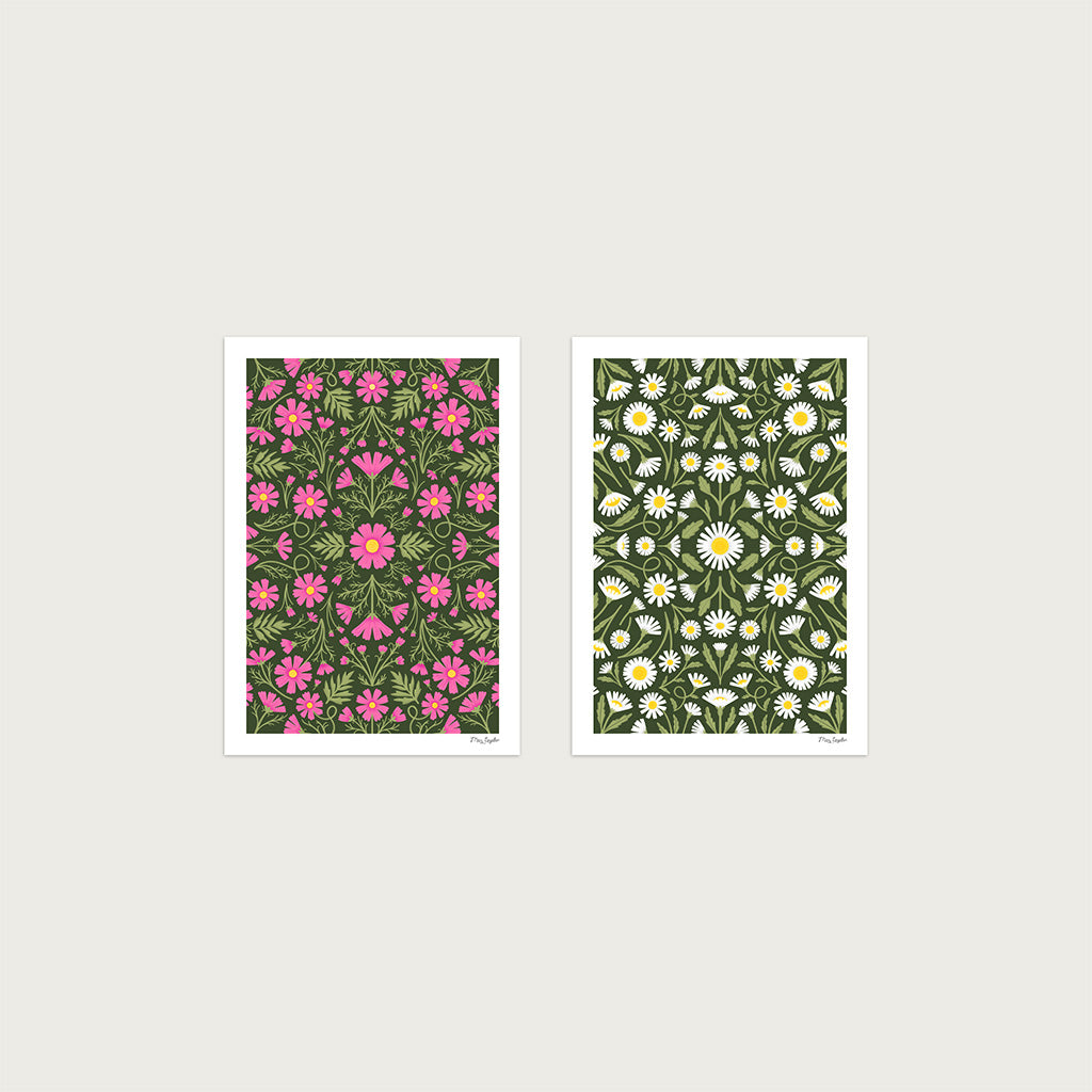 The Heritage set of 2 art prints includes one with pink flowers and green leaves, and one featuring white daisies on a green background, in a vintage botanical style that's ideal for earthy-toned interiors.
