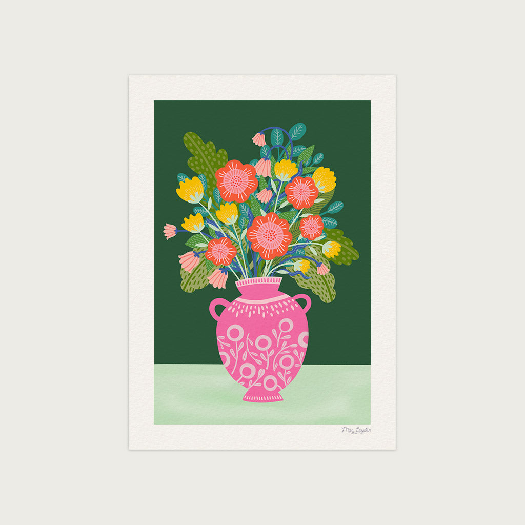 The Flower Vase Art Print features a vintage-inspired pink vase with a vibrant floral bouquet and green leaves on a dark green background—ideal for bringing colourful vibes as floral wall art to your space.