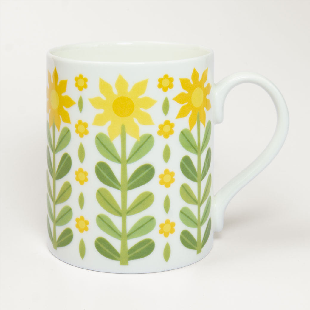 A Vintage style Green Mug with a mid century inspired design is perfect for your morning coffee.